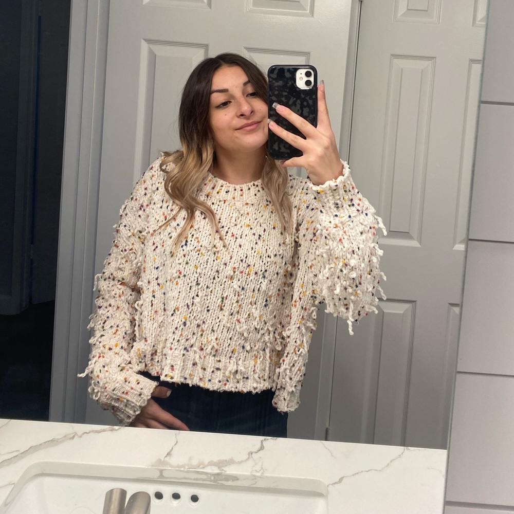 white sweater